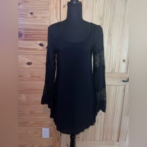 Boutique Black Dress with lace detail in sleeves